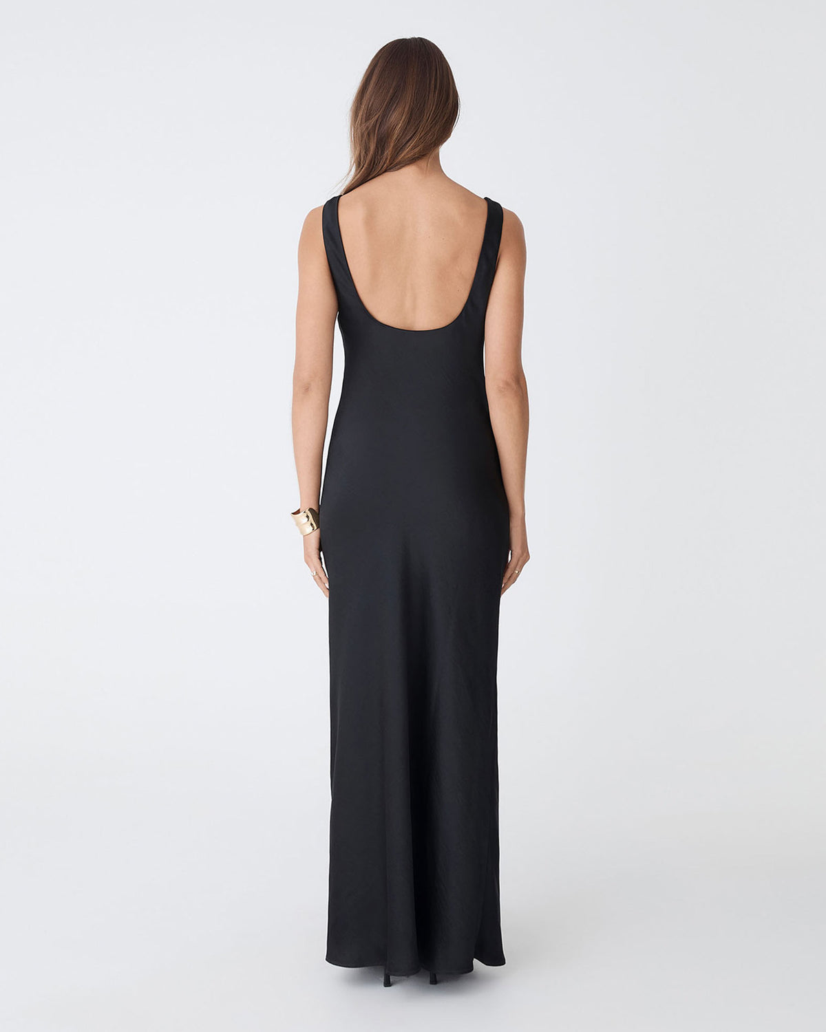 Calliope Bias Cut Slip Dress in black — back view