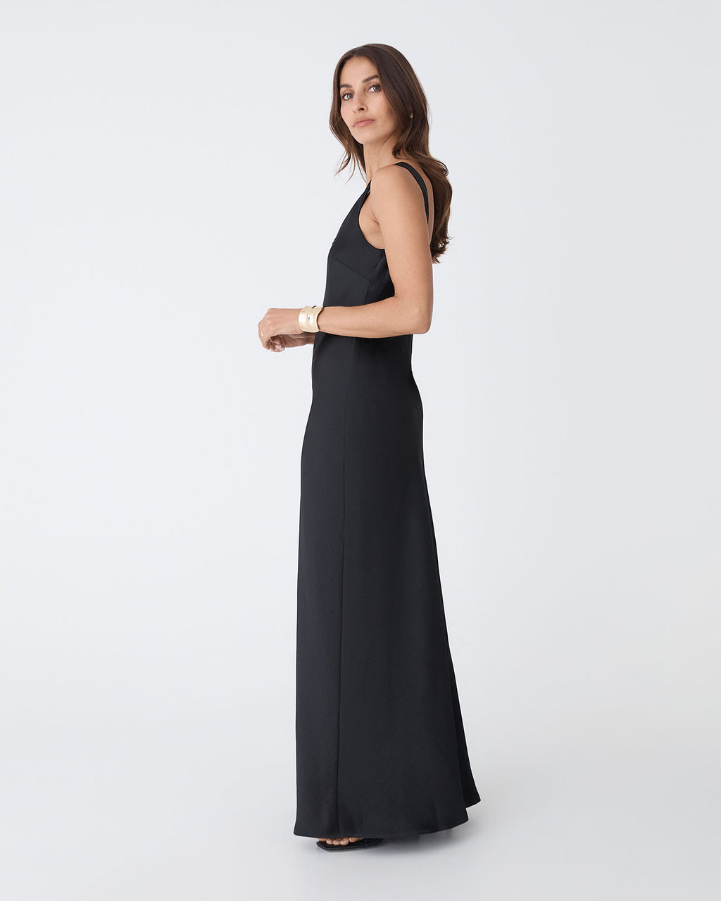 Calliope Bias Cut Slip Dress in black — side view