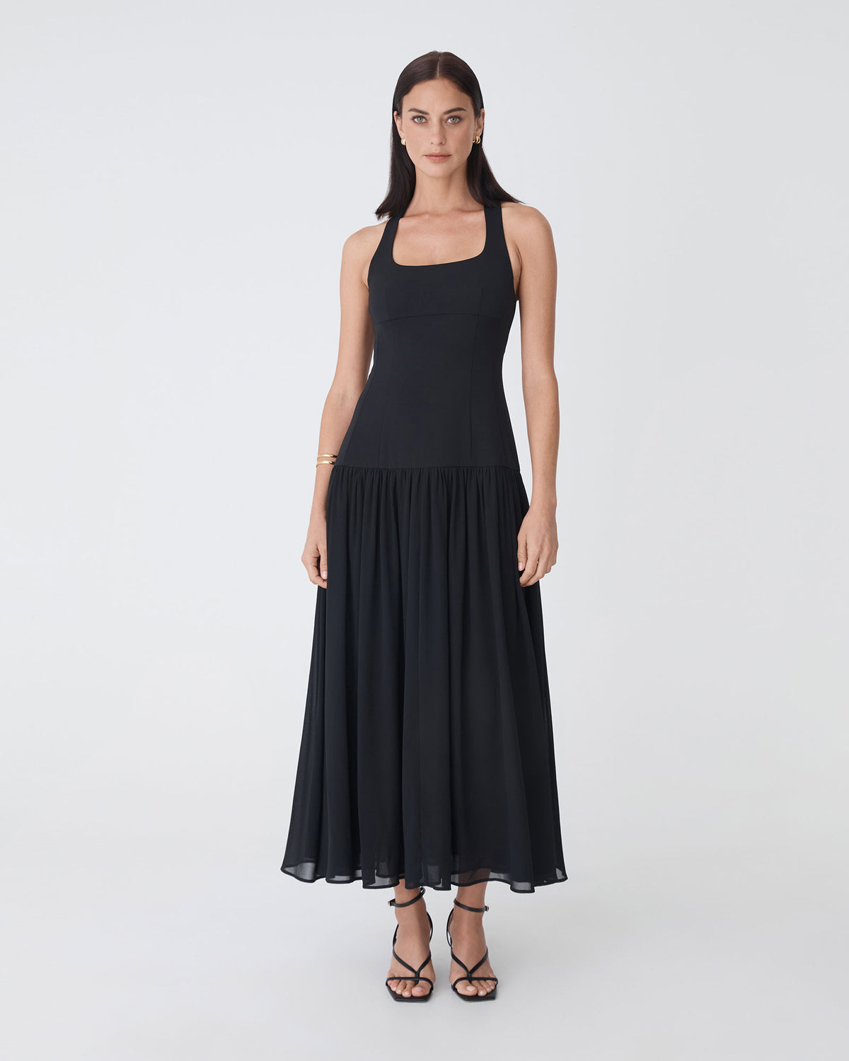 Selena Dropped Waist Dress in black — full-length view