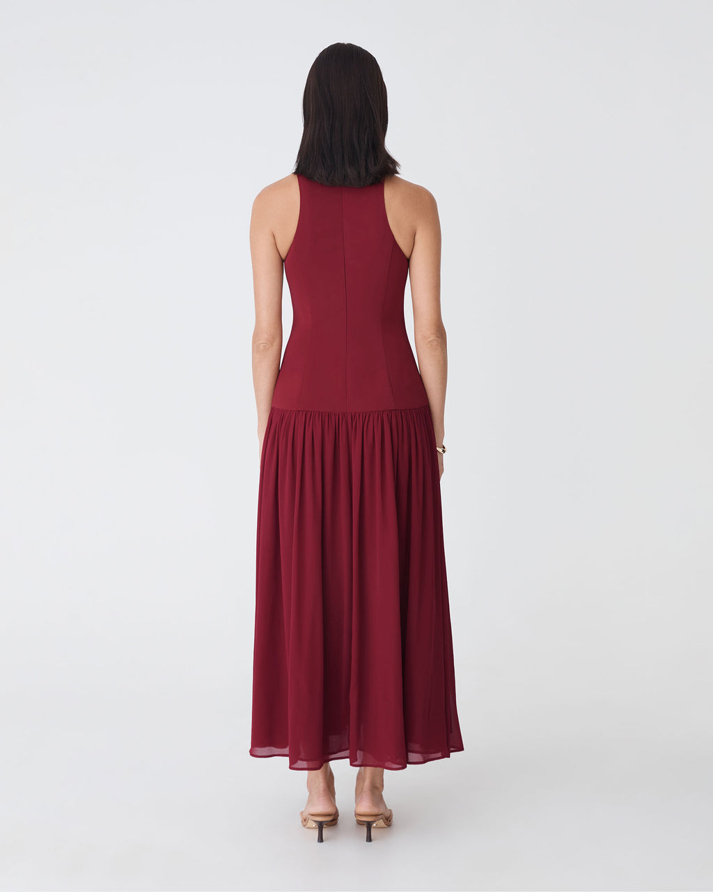 Selena Dropped Waist Dress in deep red — back view