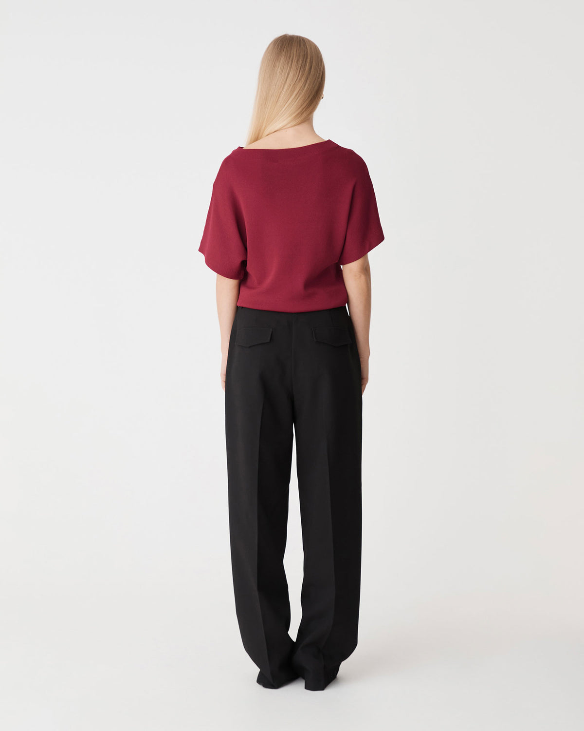Jemma Relaxed Knit Top in deep red — back view