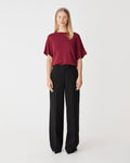 Jemma Relaxed Knit Top in deep red — full-length view