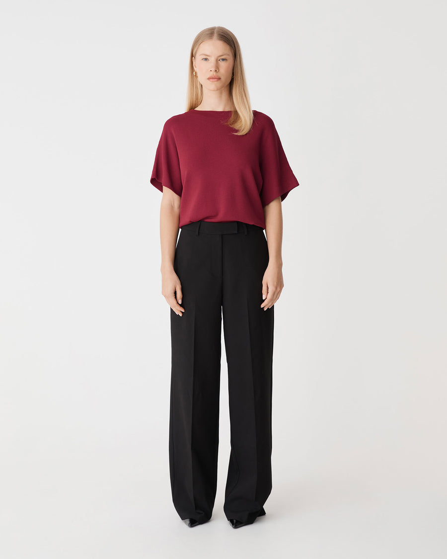 Jemma Relaxed Knit Top in deep red — full-length view