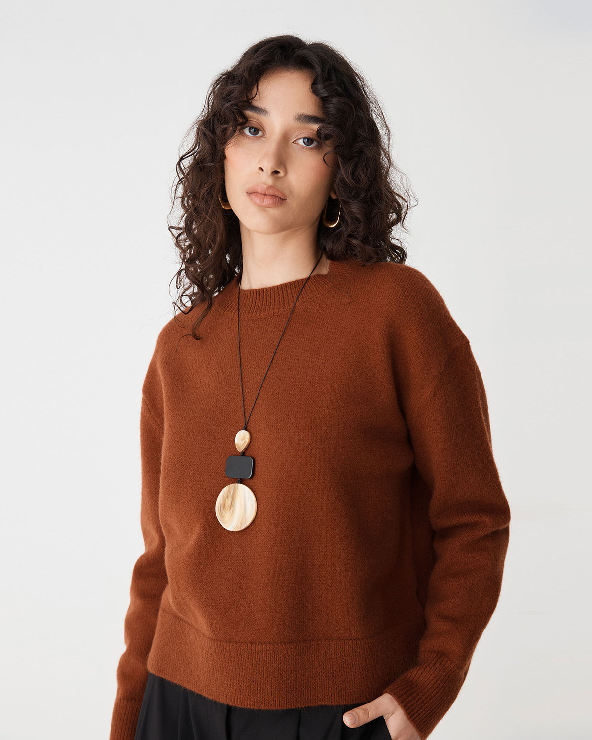 Joyli Round Neck Knit in rust — close-up view 2