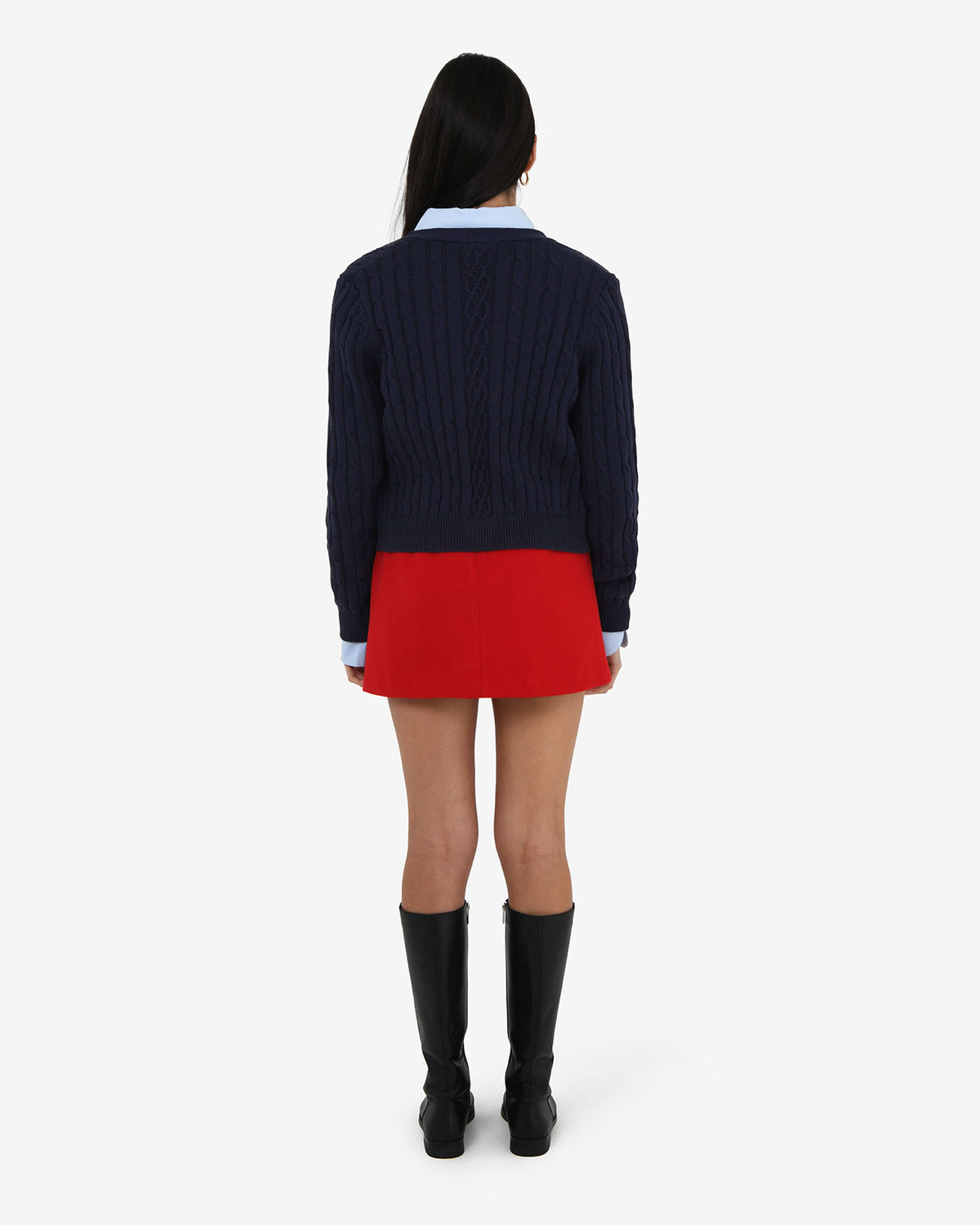 Rhodes Cable Knit Cardigan in navy — back view