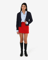 Rhodes Cable Knit Cardigan in navy — full-length view