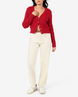 Rhodes Cable Knit Cardigan in red — full-length view
