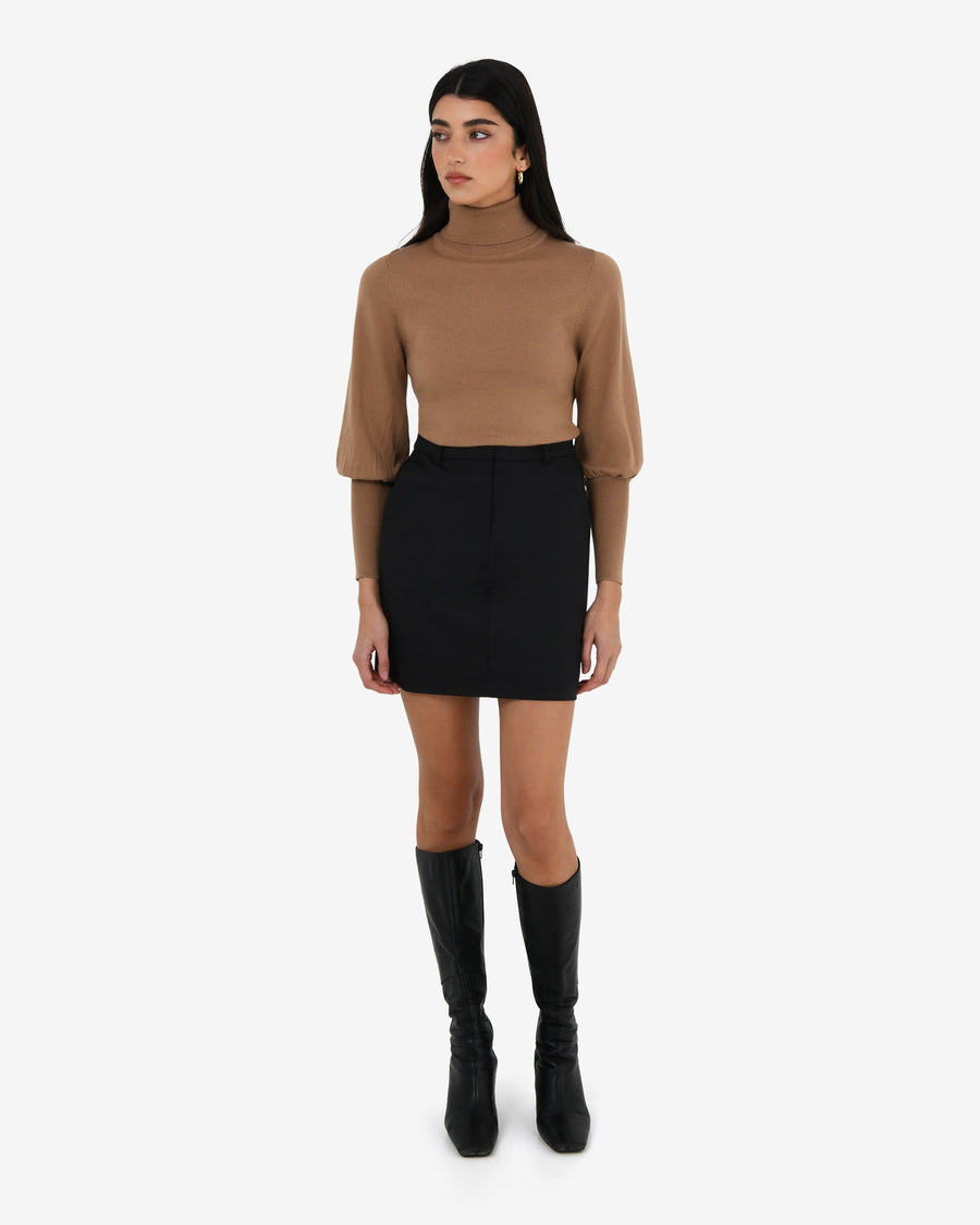 Nolan High Neck Knit in camel — full-length view