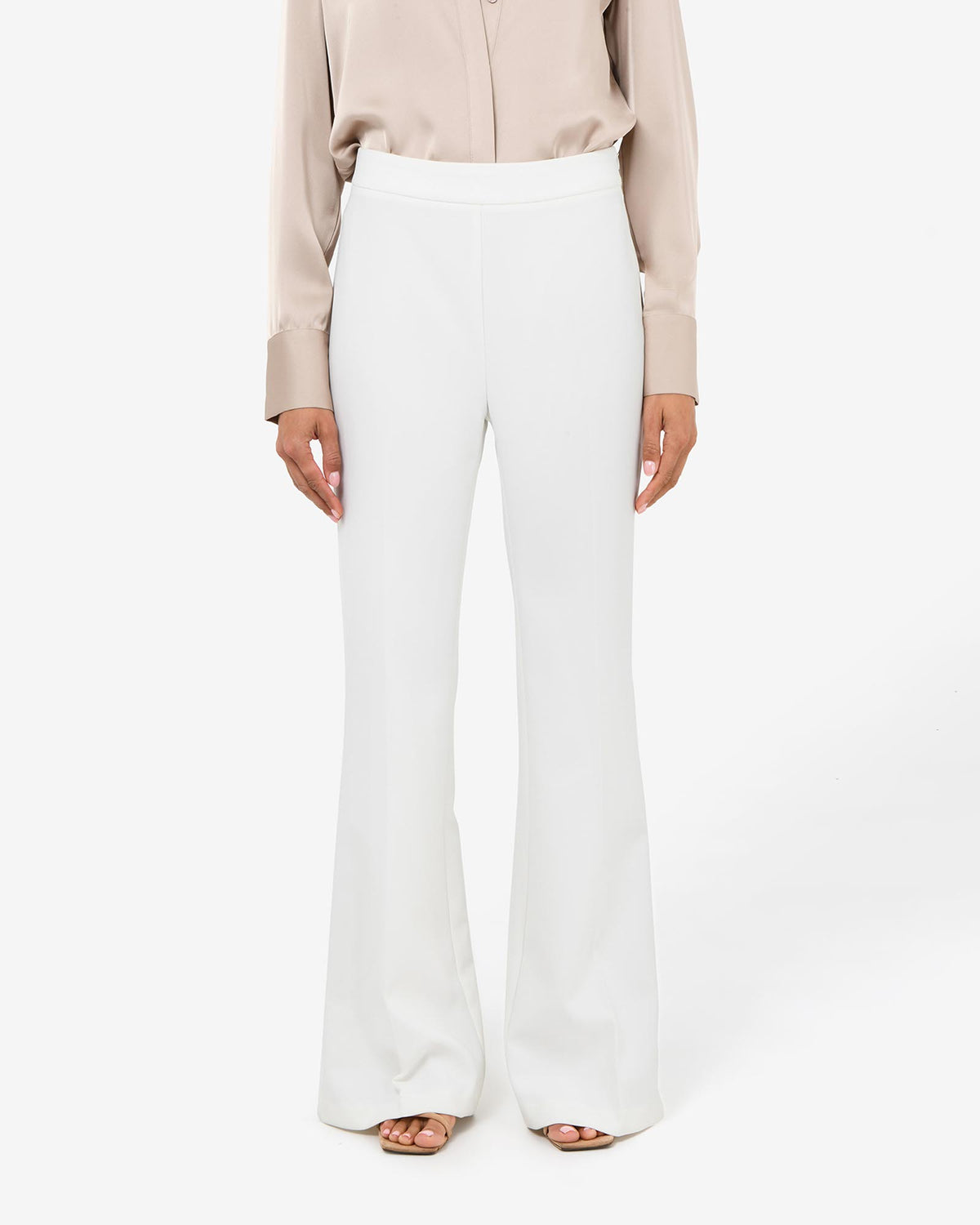 Belmore Crepe Flared Pants in snow — close-up view