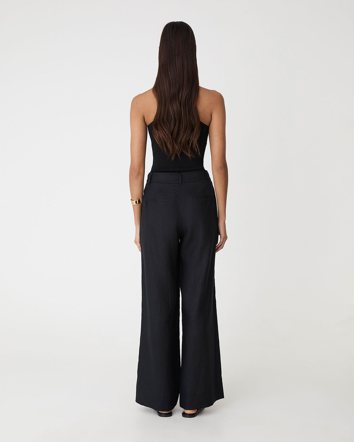 Ami Wide Leg Linen Pants in black — back view