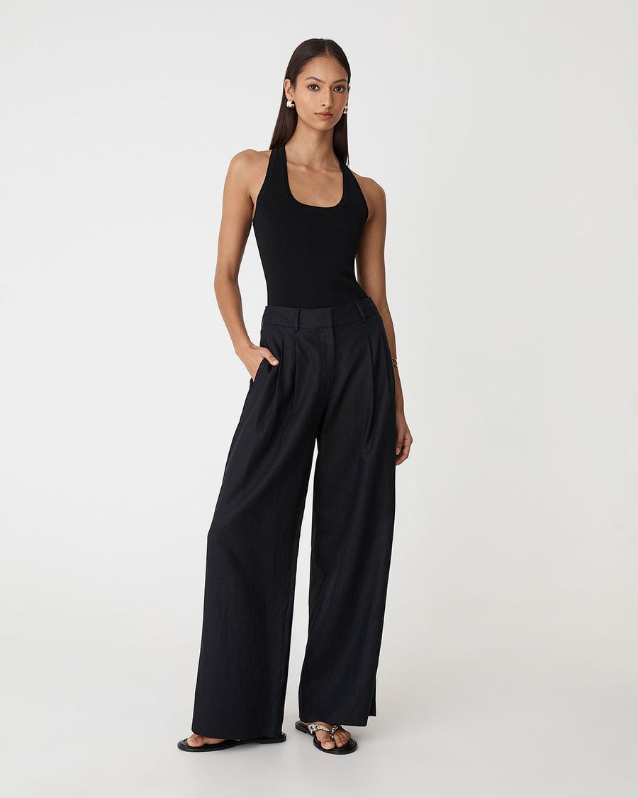 Ami Wide Leg Linen Pants in black — full-length view