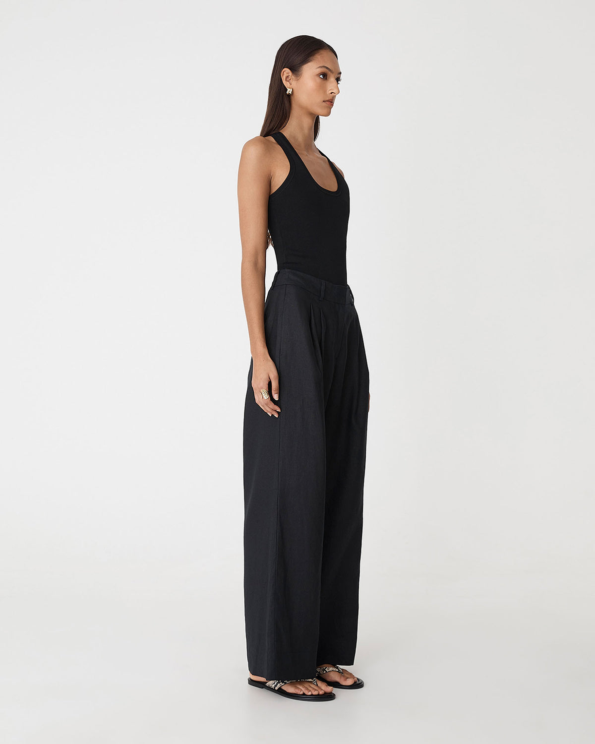 Ami Wide Leg Linen Pants in black — side view
