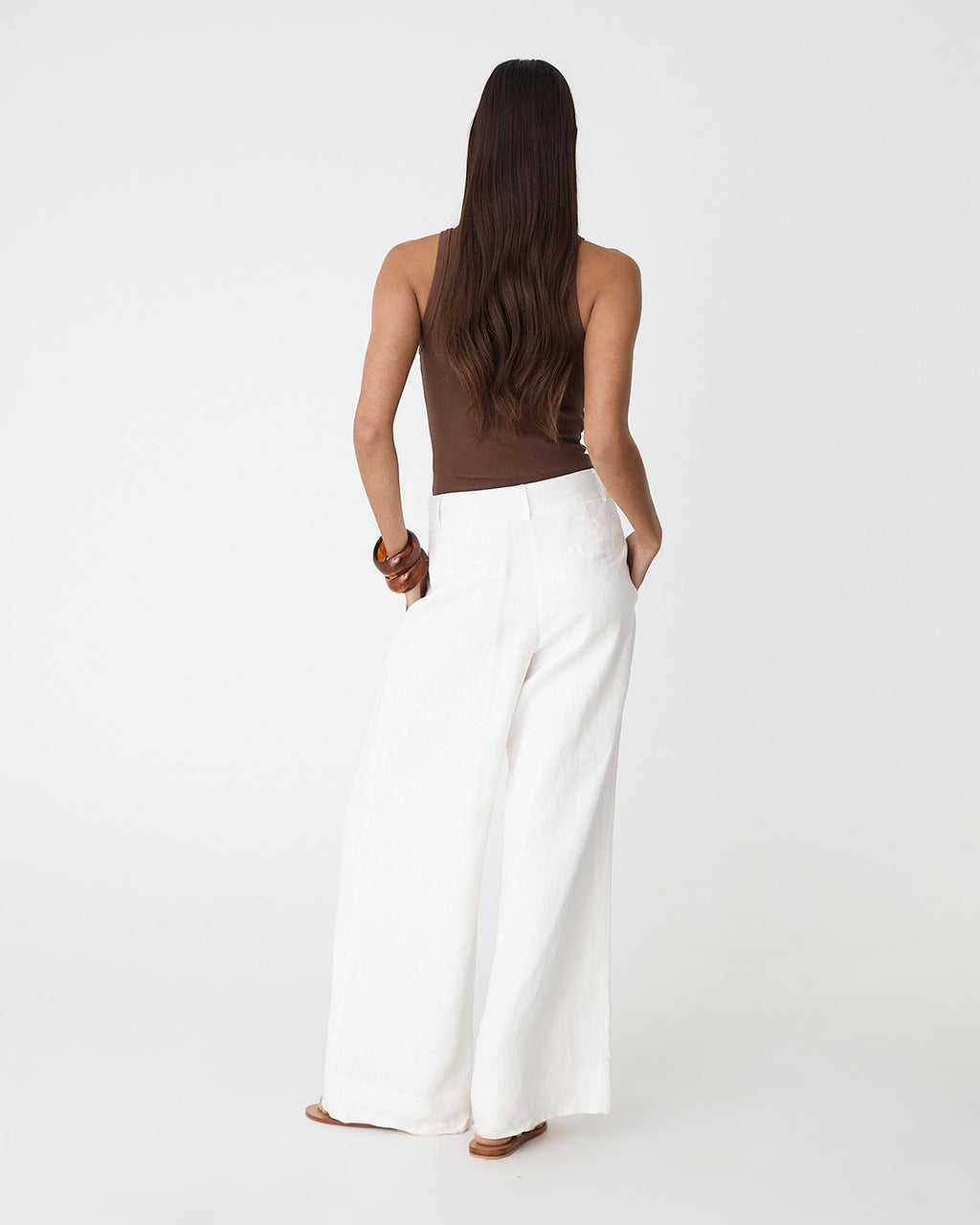 Ami Wide Leg Linen Pants in white — back view