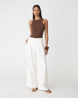 Ami Wide Leg Linen Pants in white — full-length view