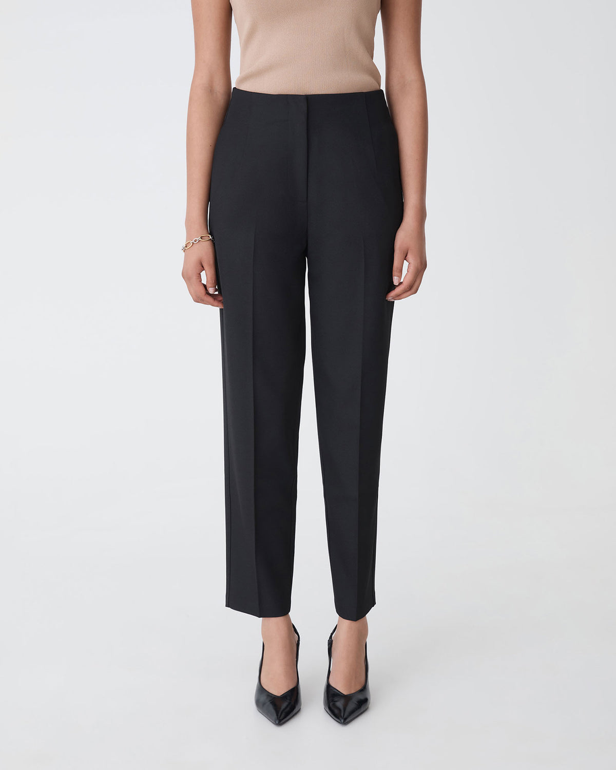 Mila Tapered Leg Pant in black — close-up view