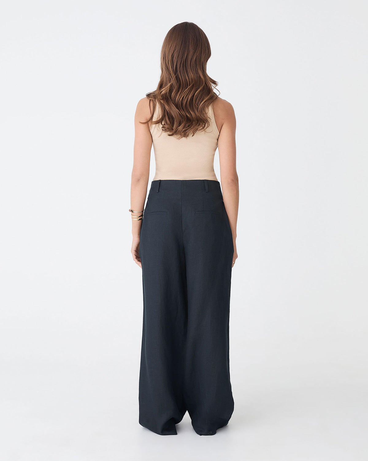 Ivy Linen Wide Leg Pants in washed black — back view