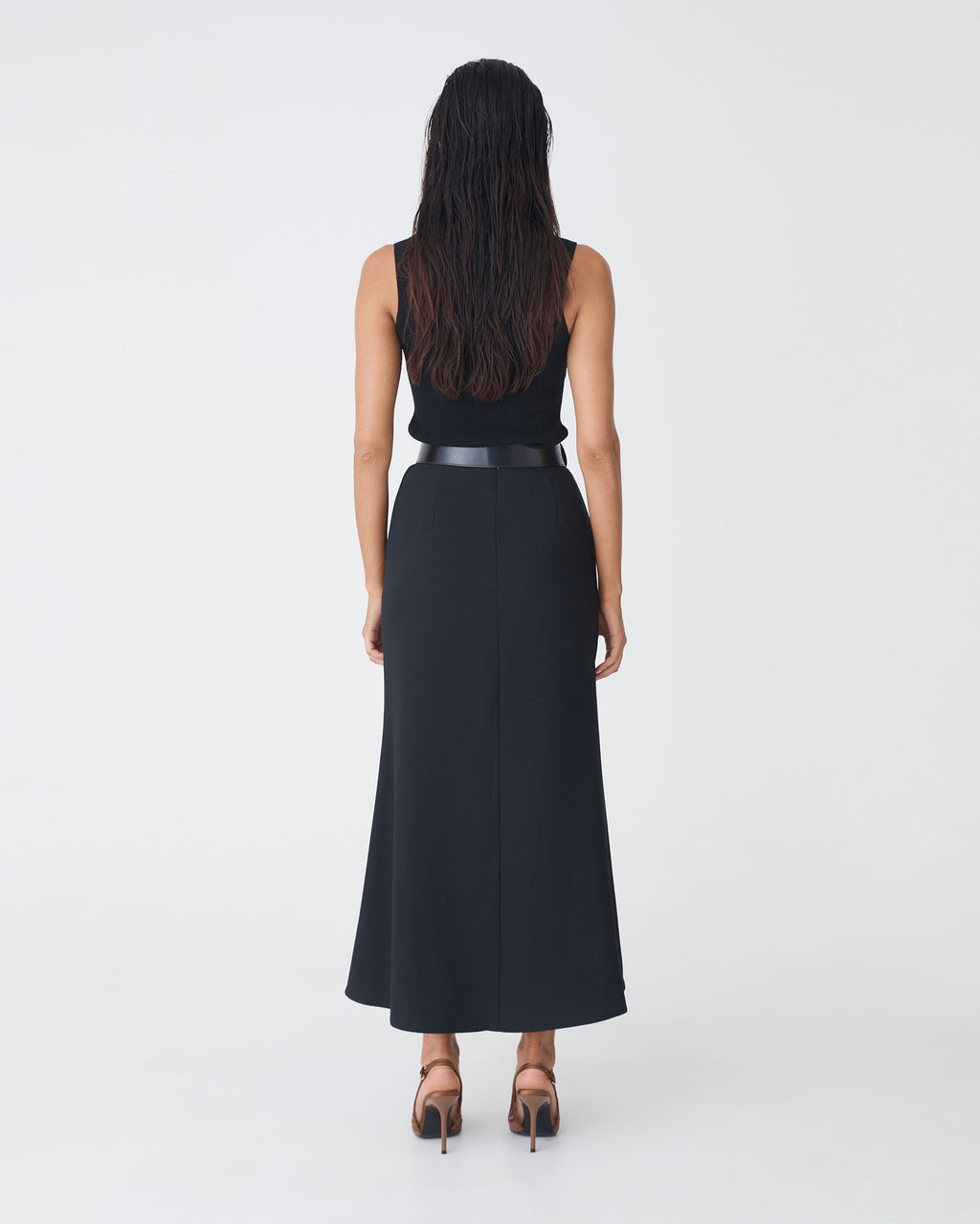 Caris Flared Maxi Skirt in black — back view