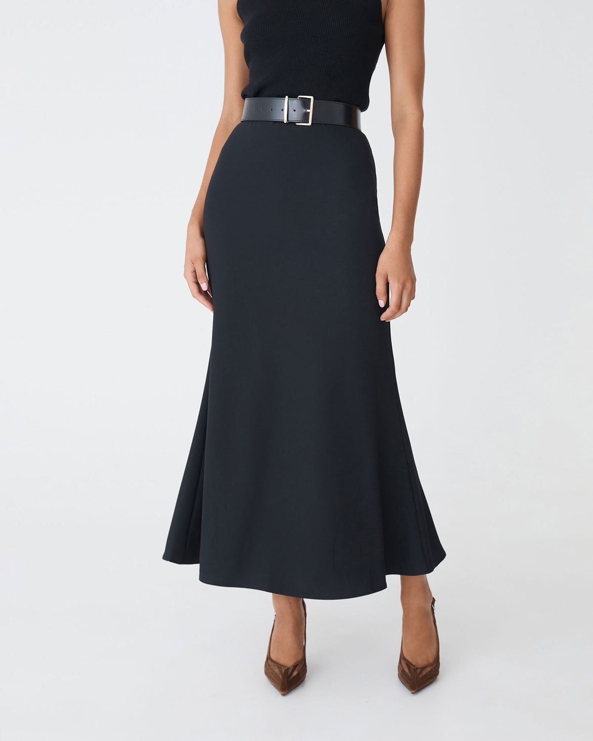 Caris Flared Maxi Skirt in black — close-up view