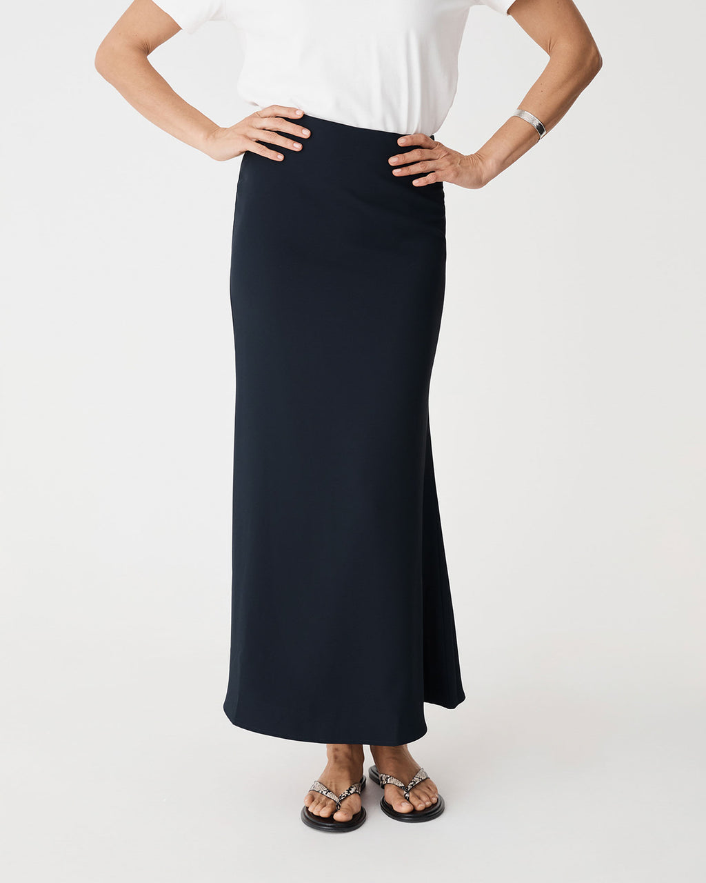 Caris Flared Maxi Skirt in navy — close-up view 2