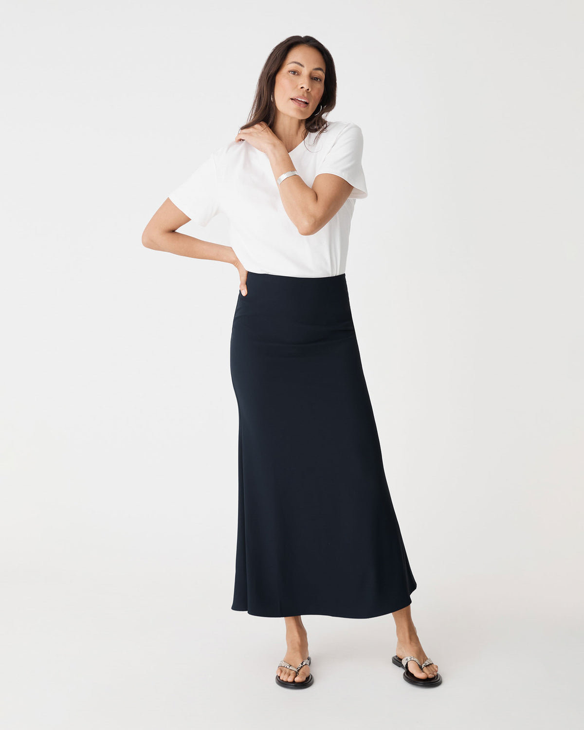 Caris Flared Maxi Skirt in navy — full-length view 2
