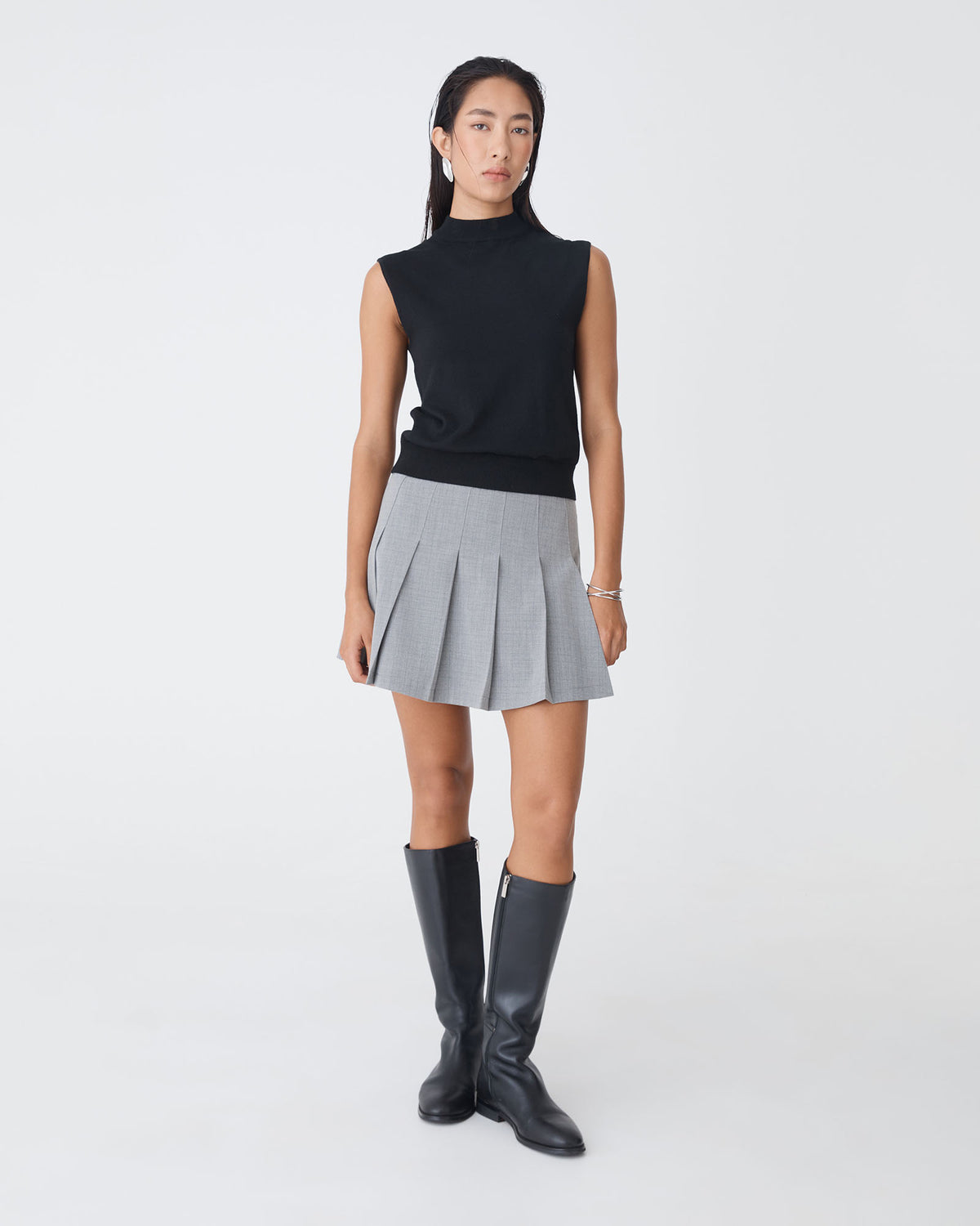 Kris Pleated Mini Skirt in grey check — full-length view