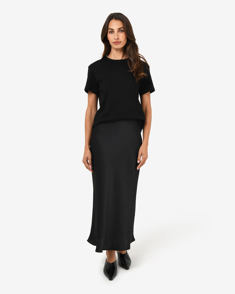 Valeria A-line Satin Skirt in black — full-length view