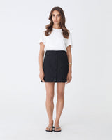 Winnie A-line Button Skirt in black — full-length view