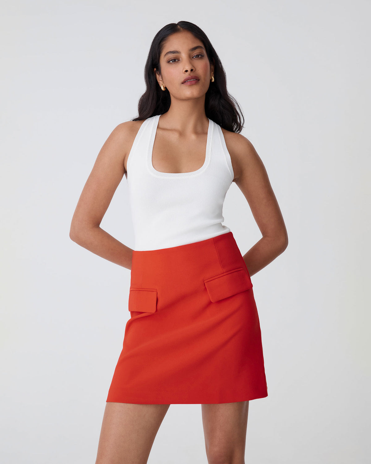 Kinsley Tailored Mini Skirt in vermilion — close-up view