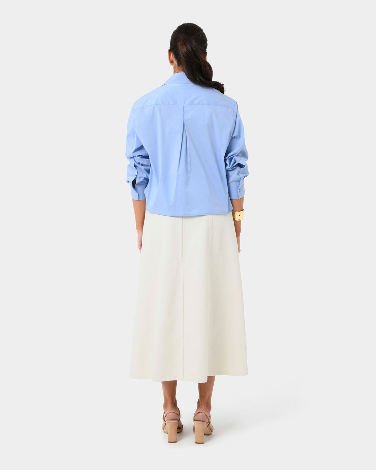 Baire Pleated Crop Shirt in blue — back view