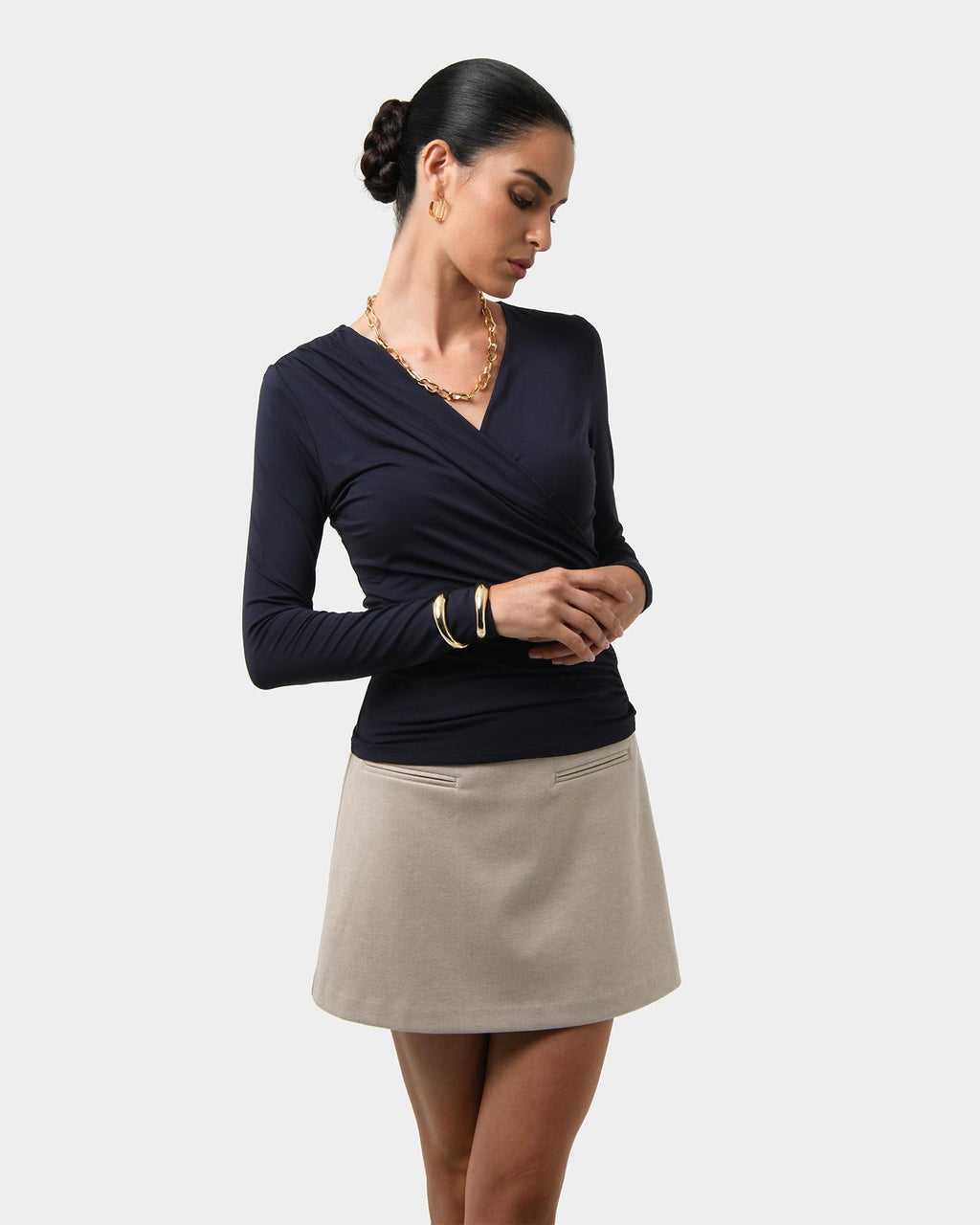 Tika Crossover Ruched Top in midnight — close-up view