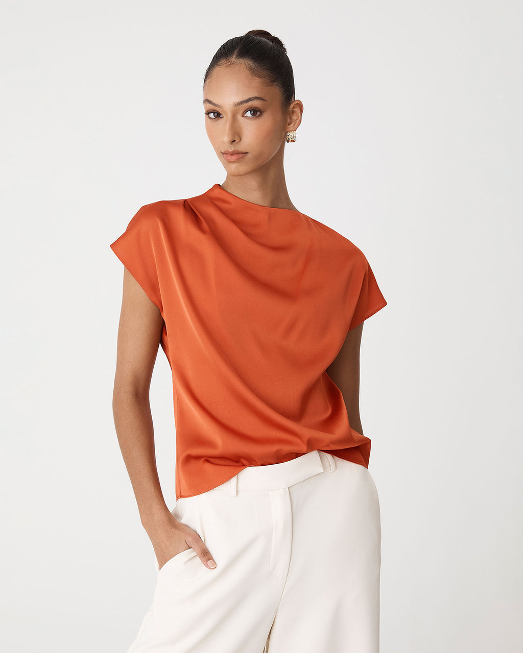 Zafina Pleated Draped Top in burnt orange — close-up view