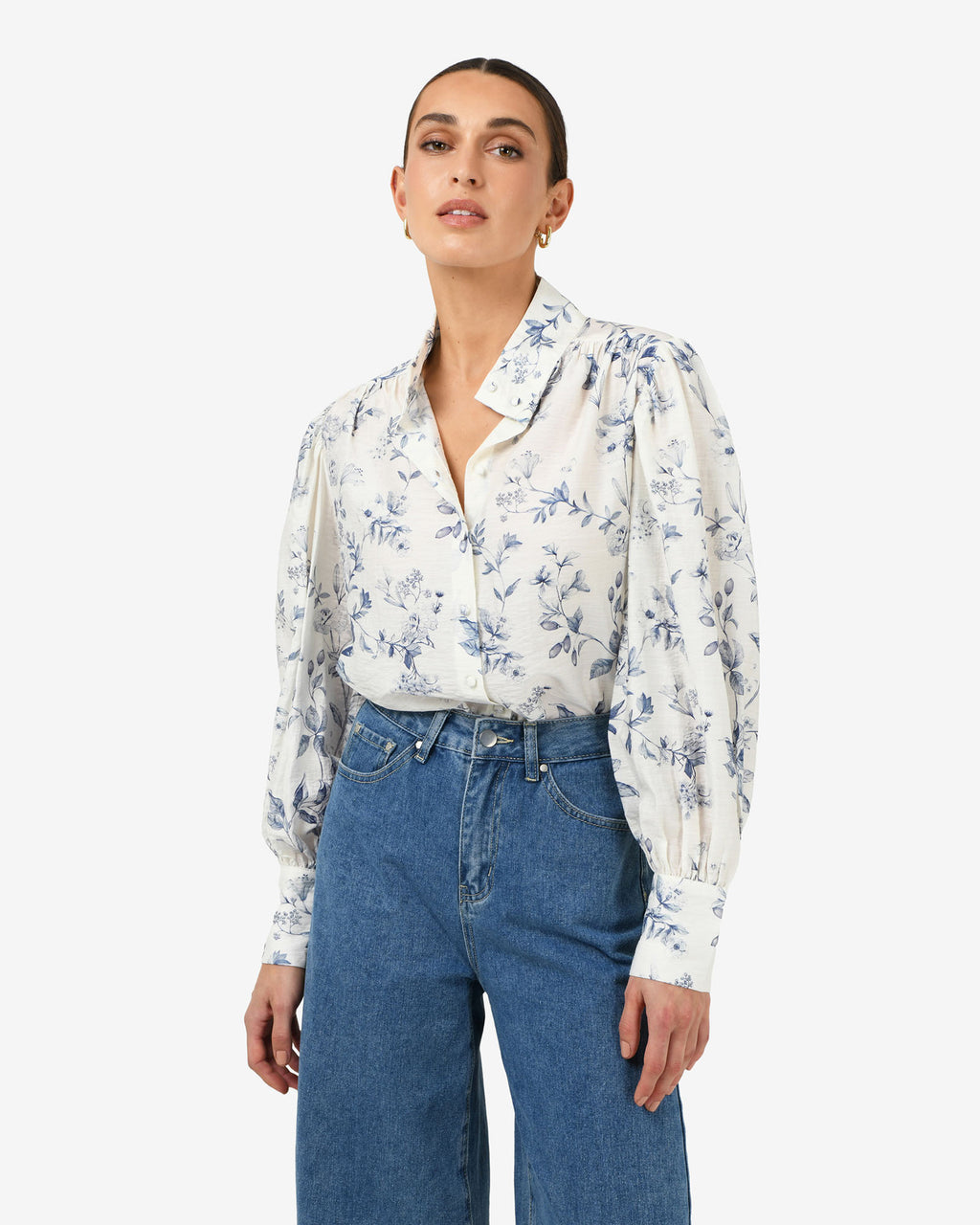 Jasmine Floral Blouse in ivory blue — close-up view