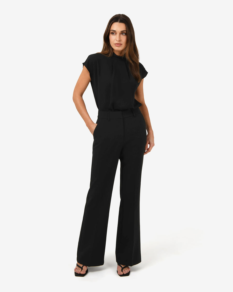 Tiara High Neck Shell Top in black — full-length view