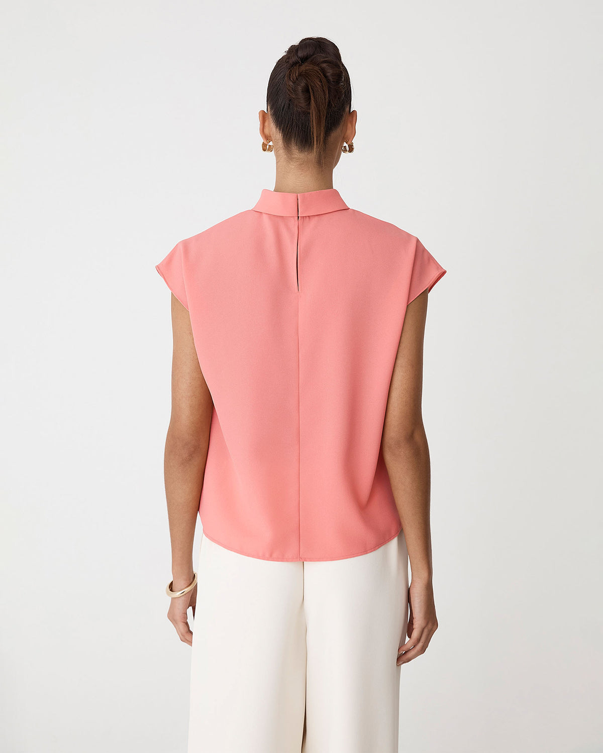 Tiara High Neck Shell Top in coral blush — back view
