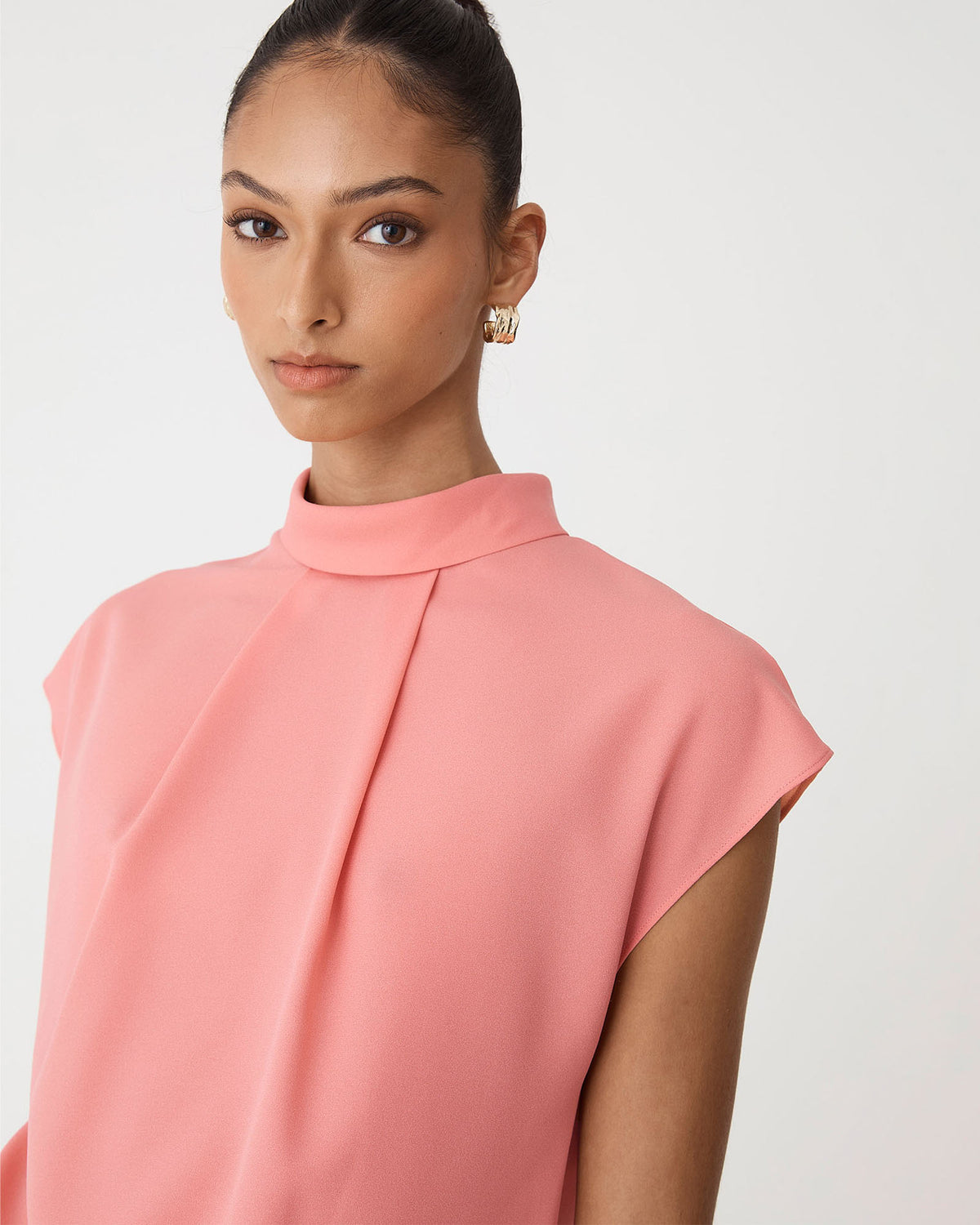 Tiara High Neck Shell Top in coral blush — fabric detail