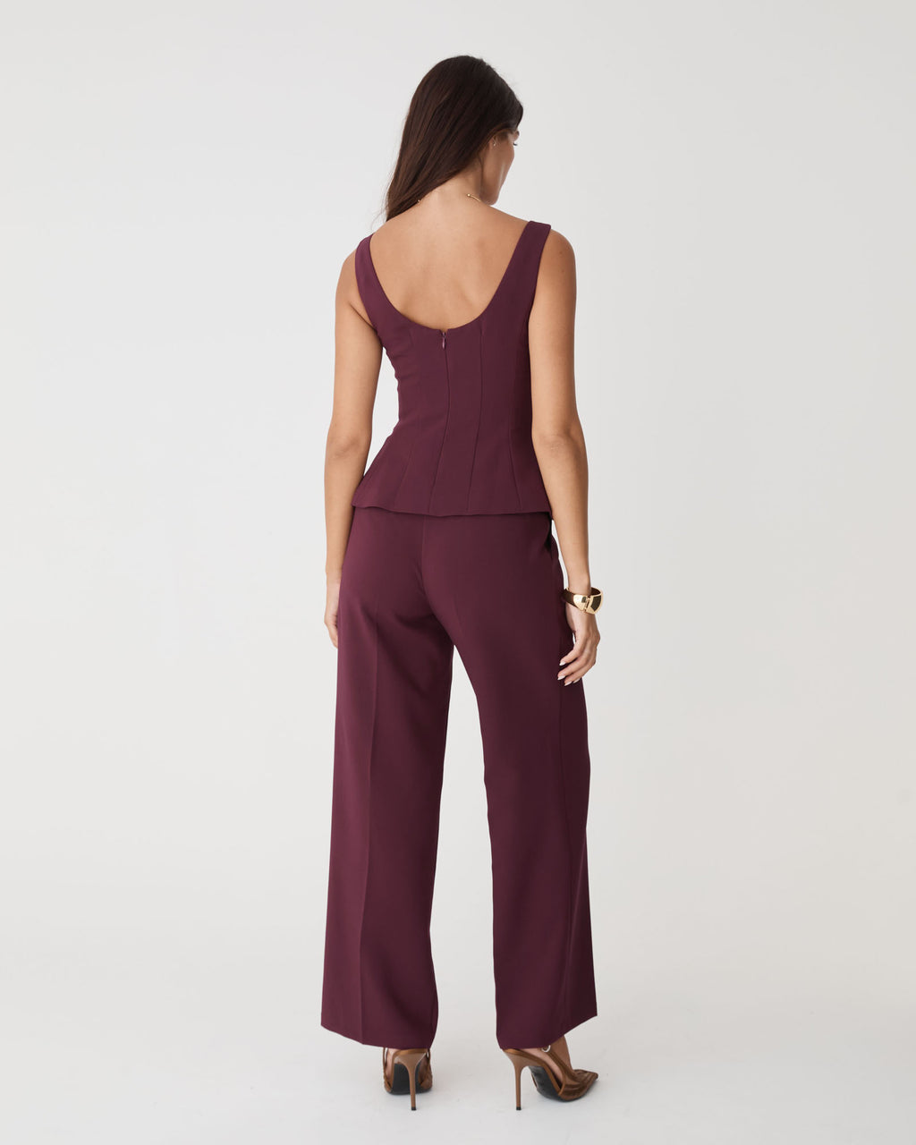 Nikki Peplum Top in bordeaux — back view