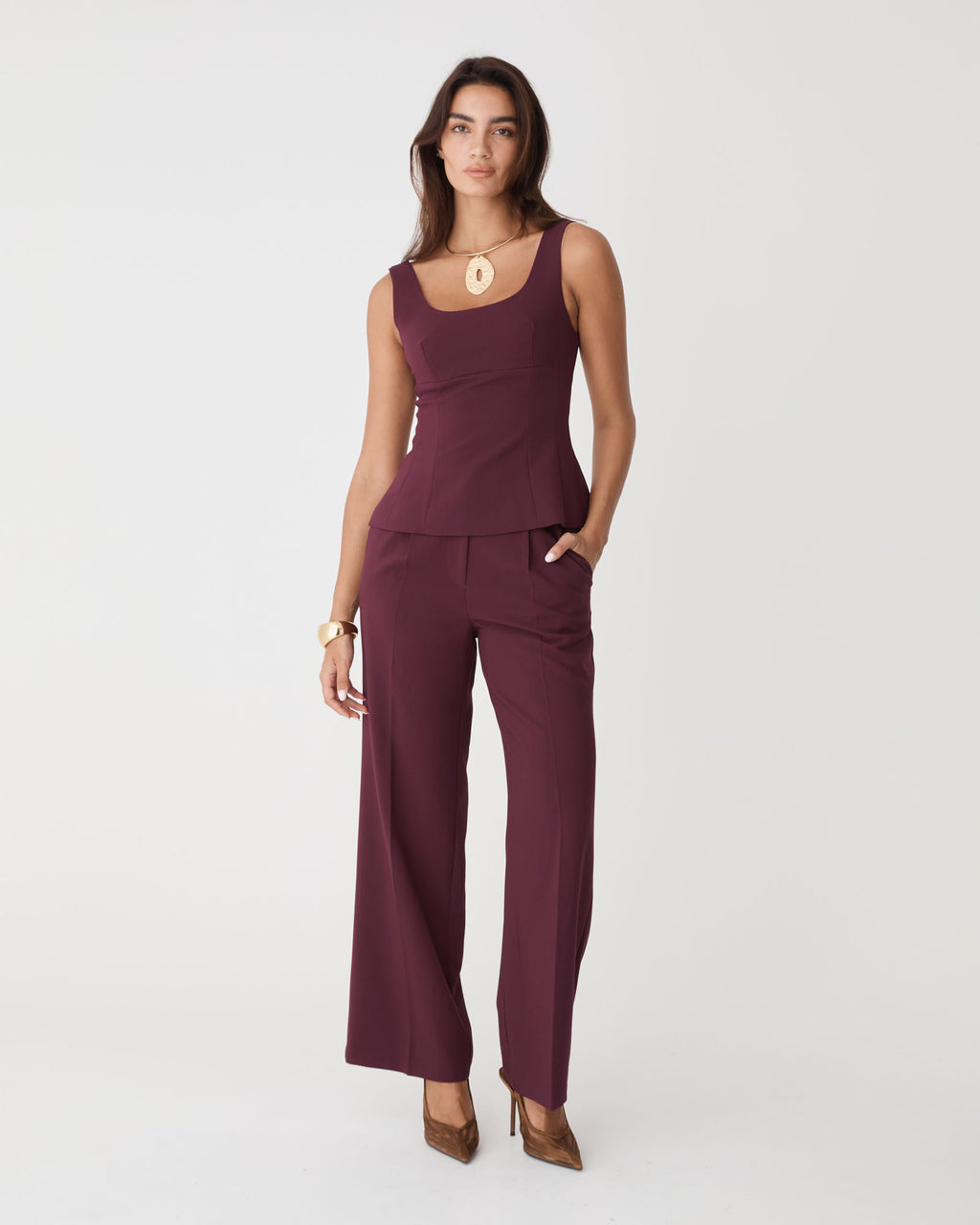 Nikki Peplum Top in bordeaux — full-length view