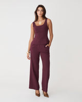 Nikki Peplum Top in bordeaux — full-length view