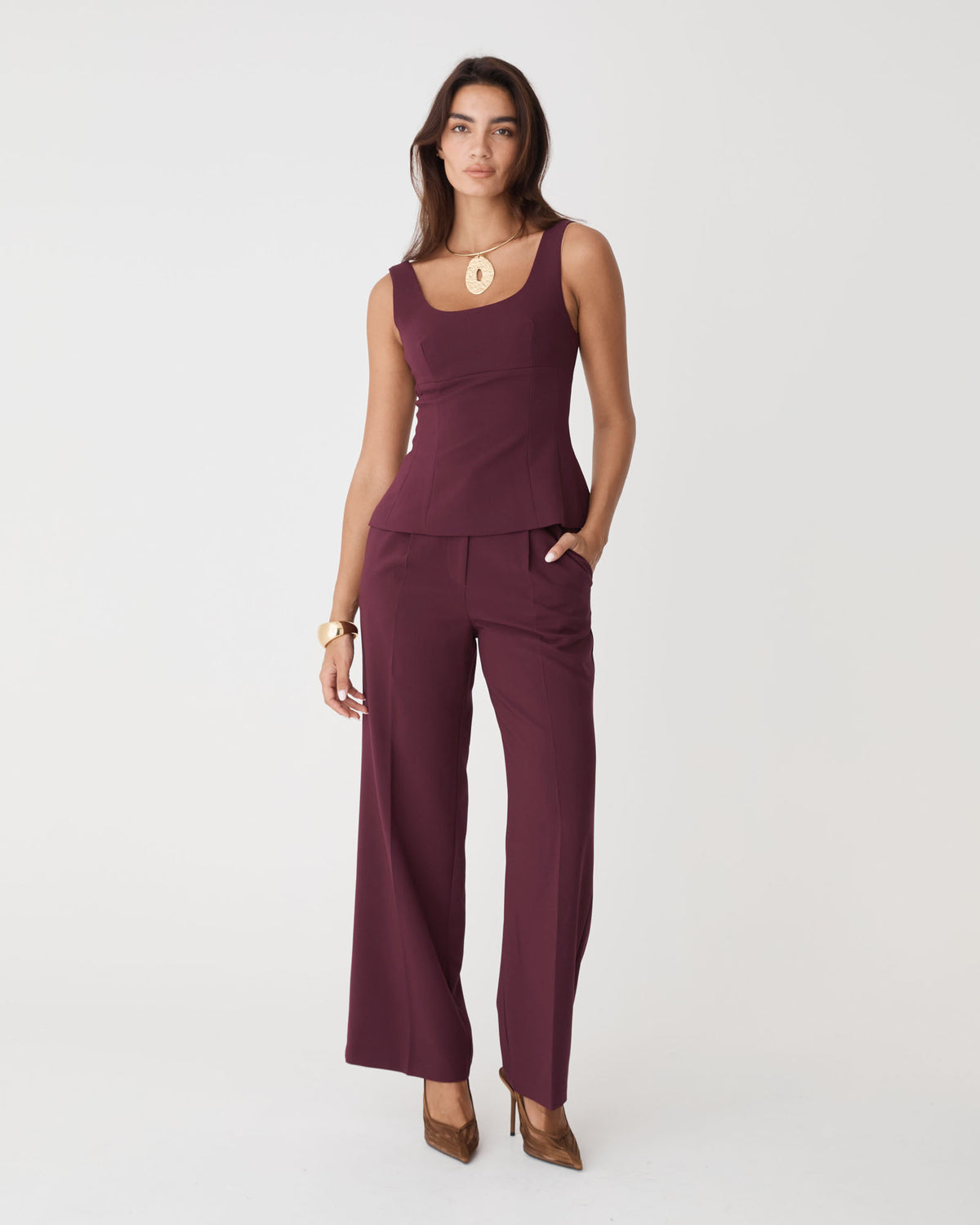 Nikki Peplum Top in bordeaux — full-length view