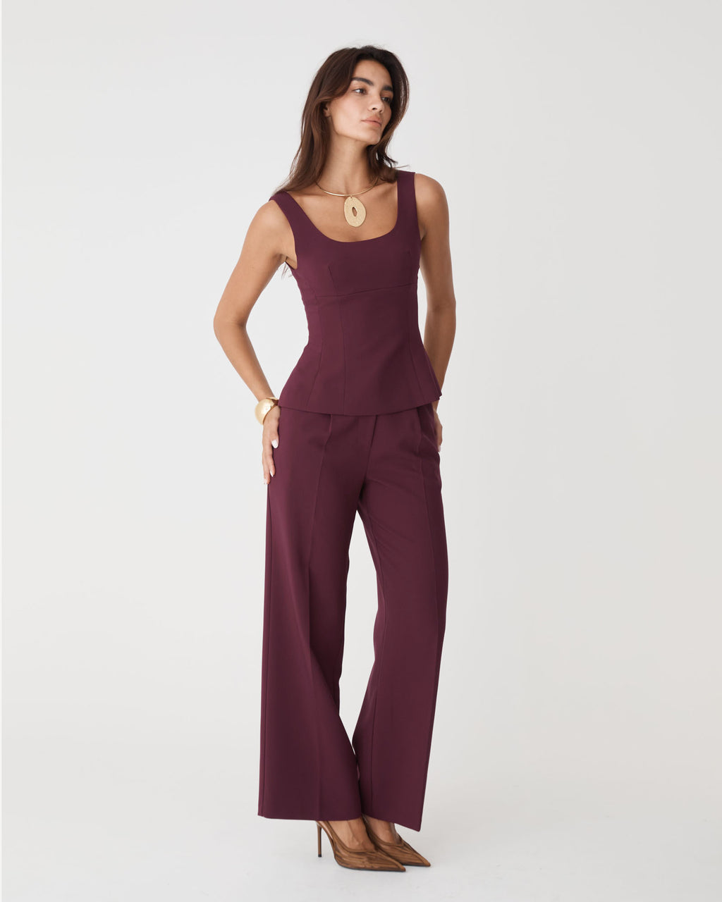 Nikki Peplum Top in bordeaux — full-length view 2