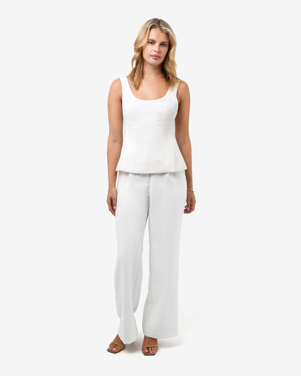 Nikki Peplum Top in ivory — full-length view