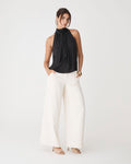 Shelby Draped Sleeveless Top in black — full-length view