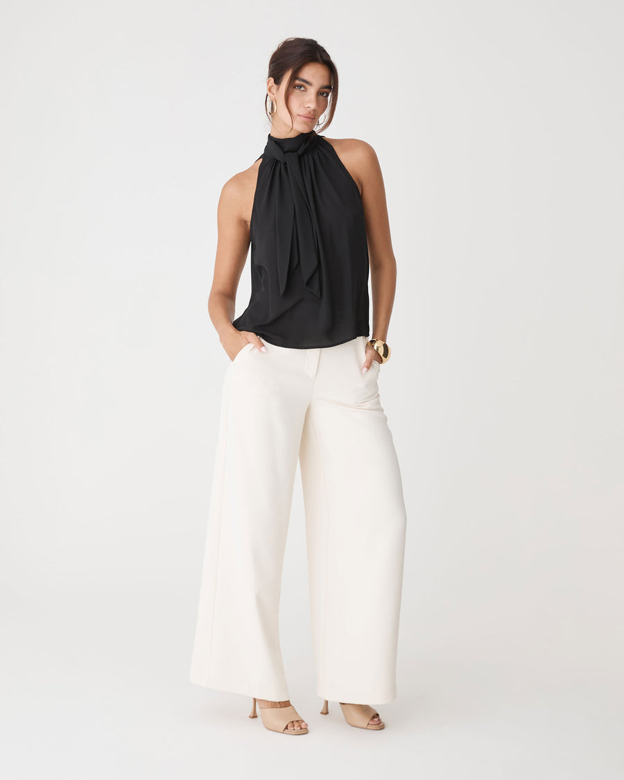 Shelby Draped Sleeveless Top in black — full-length view