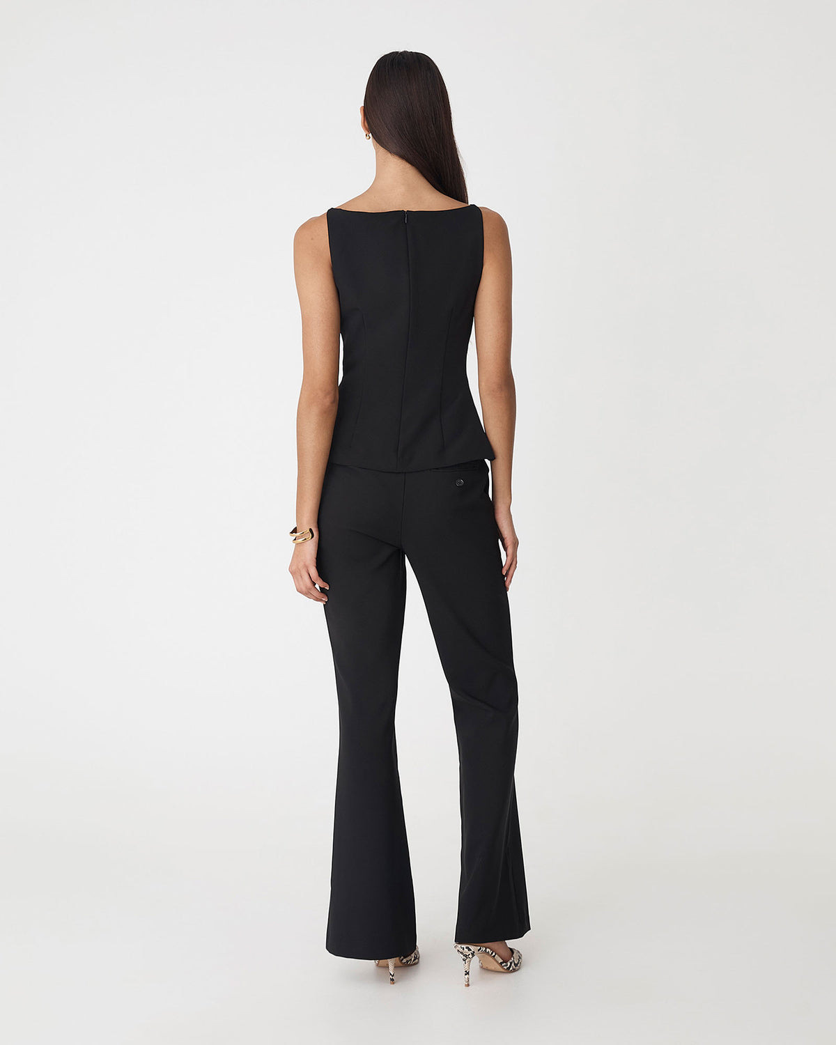 Hannah Apron Top in black — back view