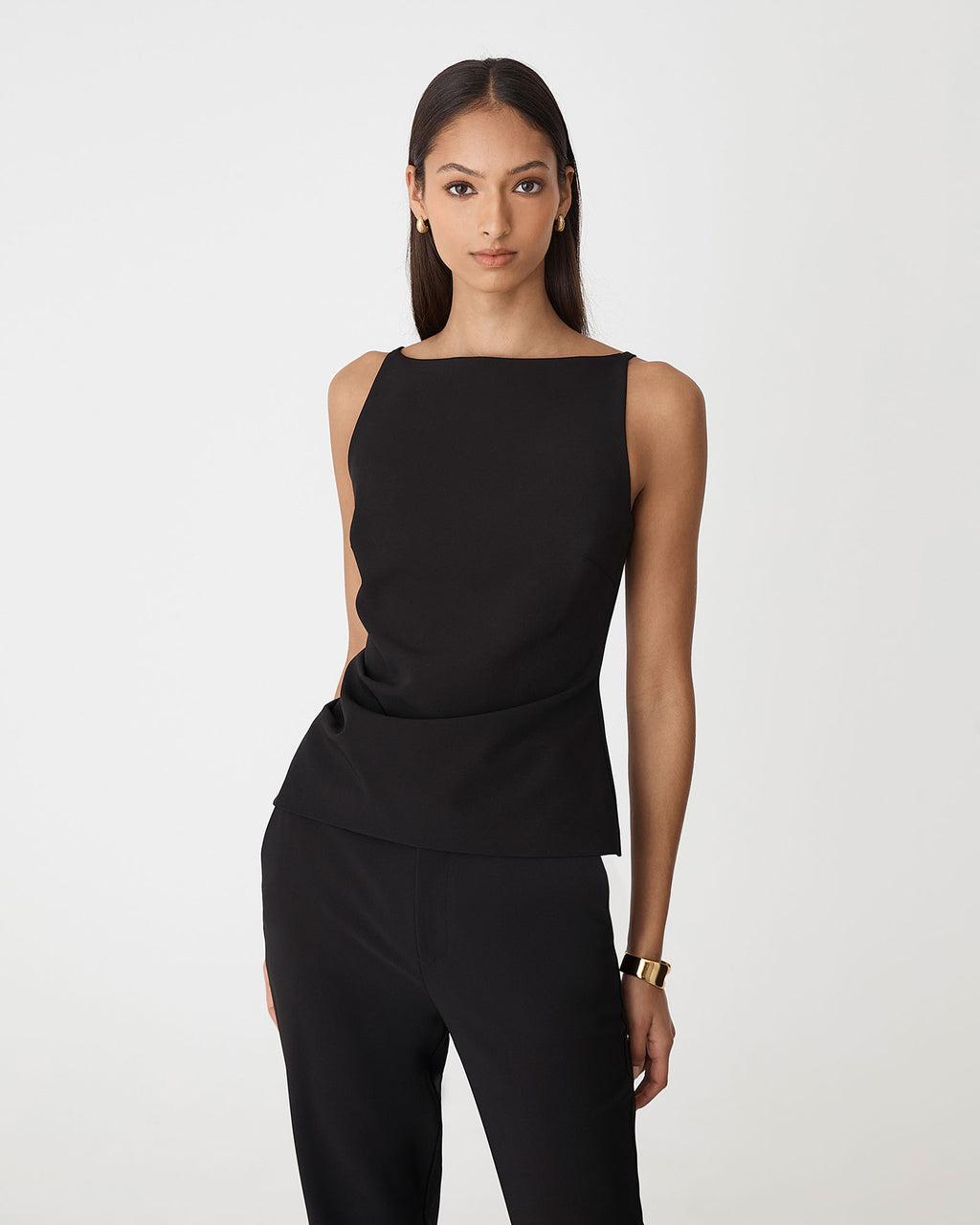 Hannah Apron Top in black — close-up view