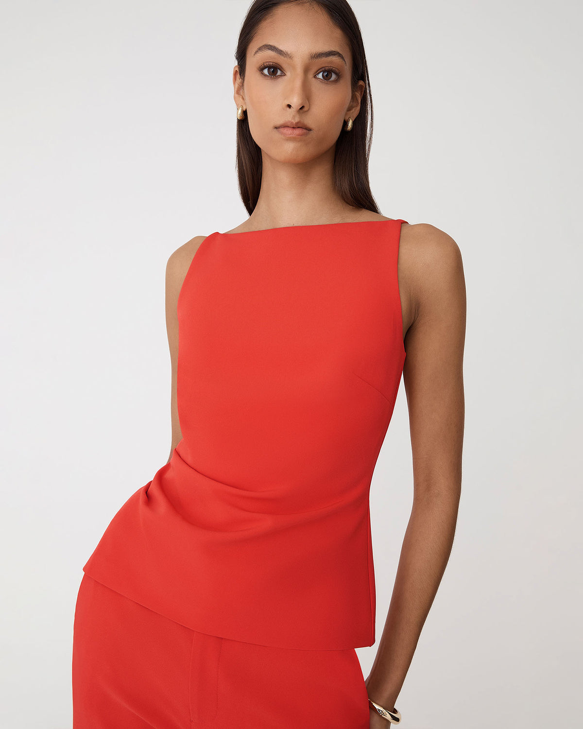 Hannah Apron Top in vermilion — close-up view 2