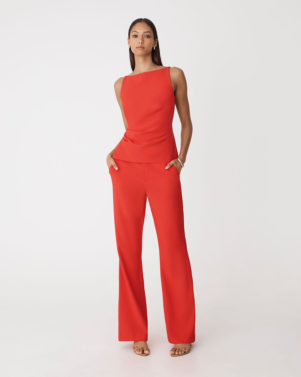 Hannah Apron Top in vermilion — full-length view