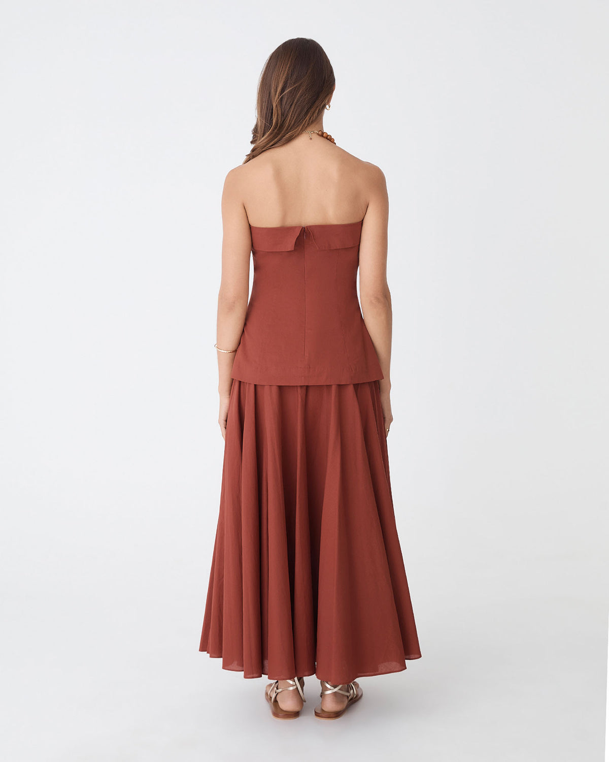 Deb Cotton Strapless Tunic in brick — back view