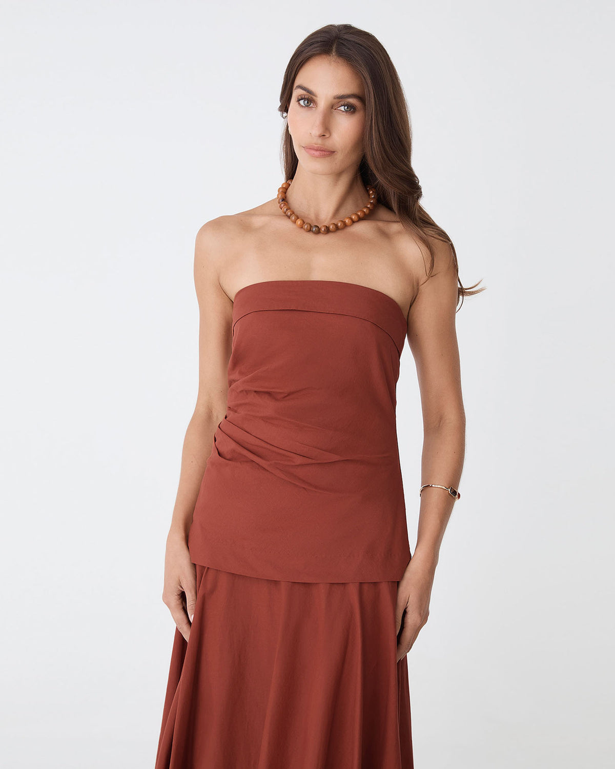 Deb Cotton Strapless Tunic in brick — close-up view