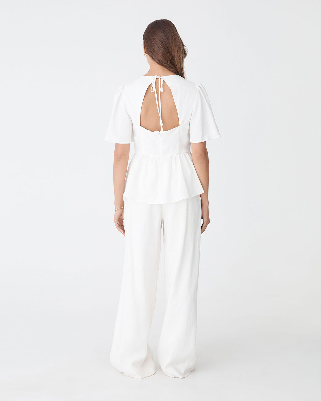 Jade Linen Peplum Top in ivory — back view 2